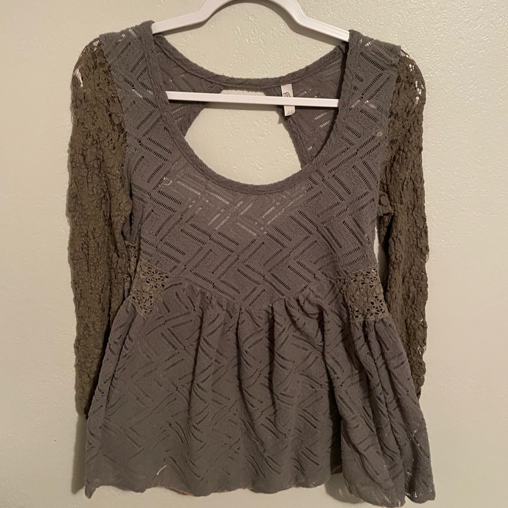 Free people intricately sewn sage colored top . Cute , flowing style